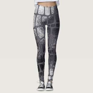 Leggings Piel de serpiente negra metálica: Textura elegante
