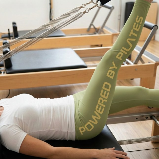 Leggings Pilates Monogram Create Your Own Design Olive (Olive green Pilates leggings worn by a woman on a reformer)