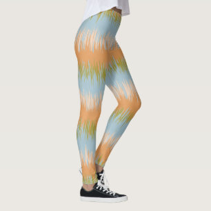 Leggings Polainas anaranjadas de la raya del extracto de la