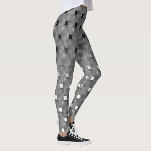 Leggings preta e branco, e grandes placas cinza com efetos