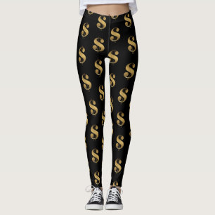 Leggings Rótulos del dólar dorado en negro