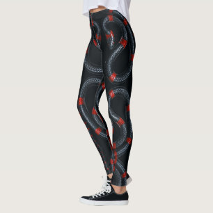 Leggings Serpiente negra y roja sobre las piernas negras