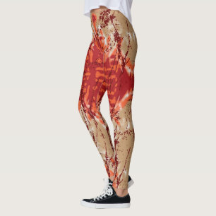 Leggings Una tela con un patrón naranja y marrón,