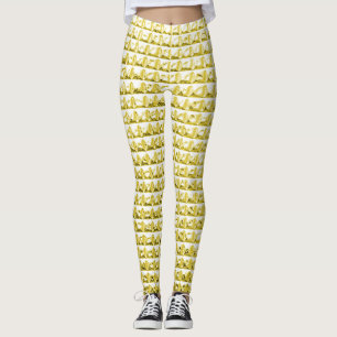 Leggings Vidrio negro dorado: superficie lujosa.