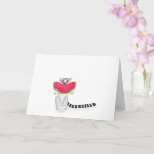 Lémur de cola anillada que come una tarjeta de san