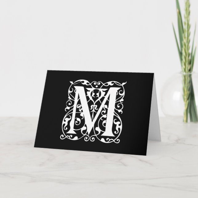 Letra elegante M blanca sobre monograma negro (Anverso)
