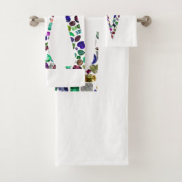 Letra inicial con diseño gemstone