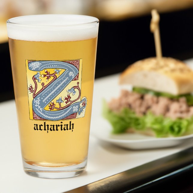 Letra medieval azul y marfil rojo con iluminación  (Subido por el creador)