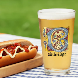 Letra medieval azul y marfil rojo iluminada B