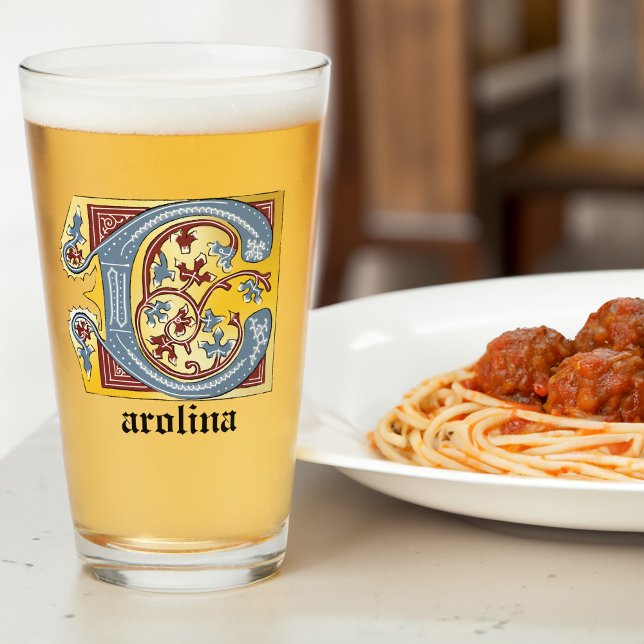 Letra medieval azul y marfil rojo iluminada C (Subido por el creador)