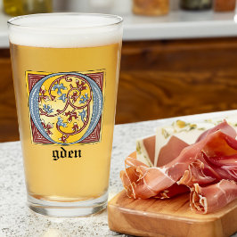 Letra medieval azul y marfil rojo iluminada O