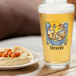 Letra medieval azul y marfil rojo iluminada U