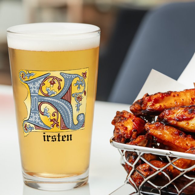 Letra medieval azul y roja marfil iluminada K (Subido por el creador)