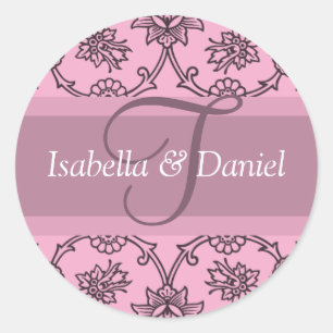 Letra monogramada sobre sellos T