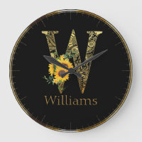 Letra negra y oro W girasol reloj redondo