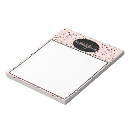 Letras doradas rosa elegantes en cuaderno negro