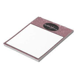 Letras doradas rosadas elegantes en cuaderno negro