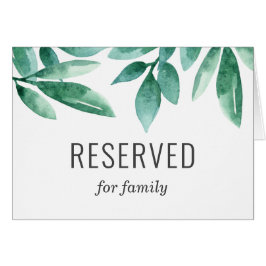Letrero de reservado de boda con follaje verde acu