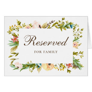 Letrero de reservado de boda con vegetación floral