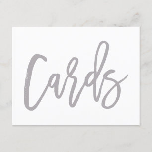 Letrero de tarjetas de boda plateadas con letra a 
