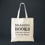 Leyendo bolsos de mano<br><div class="desc">Leer libros elimina la pena del corazón. -Proverbio marroquí Una cita reflexiva para un bolso de tote de libro.</div>