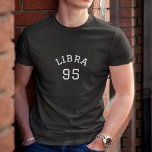 Libra | Camiseta de cumpleaños negra<br><div class="desc">Presentamos nuestra camiseta de la estrella de personalizable Libra que te permite mostrar orgullosamente tu signo de zodiaco y año de nacimiento en una tipografía blanca elegante y única! Fabricado con materiales de alta calidad y un diseño elegante, esta camiseta es la adición perfecta a cualquier armario de los aficionados...</div>