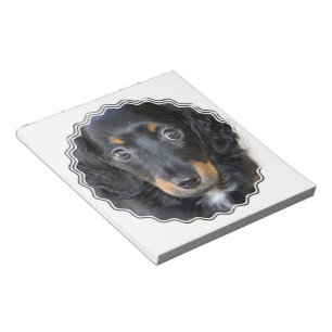 Libreta del perro de perrito de Daschund