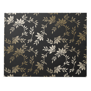 Libreta negra floral del oro de la hoja de papel