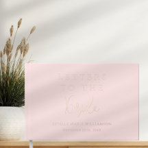 Letras personalizadas en rosa dorado para la novia