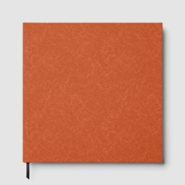 Libro De Visitas Orange textured surface with swirling pattern