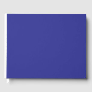Libro De Visitas una pared azul con un reloj