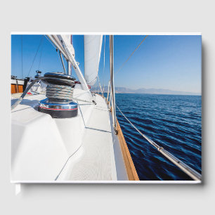 Libro De Visitas vela navegando por el mar