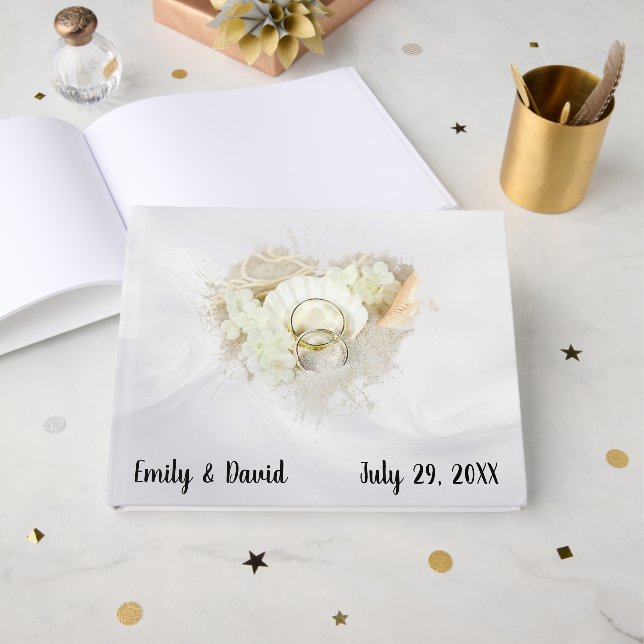 Libro De Visitas Wedding Rings in Seashell On White Satin (Anverso Abierto)