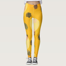 Libros voladores en leggings de oro