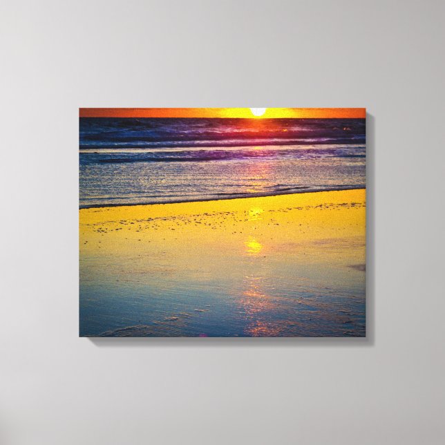 Lienzo Amanecer sobre el océano y reflejado en la playa (Anverso)