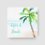 Lienzo Árbol de palmas de color de playa tropical<br><div class="desc">Arte tropical en la pared sobre lienzos envueltos con una pintoresca playa de color acuático y palmeras con la leyenda "Life's a Beach". El título se puede personalizar fácilmente con tu propio dicho favorito - sólo tienes que hacer clic en "personalizar". Ideal para una casa de playa, una decoración casera...</div>