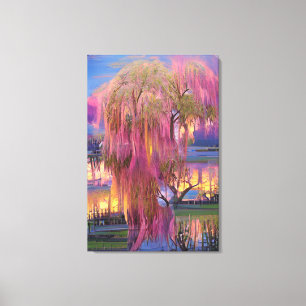 Lienzo Árbol guiado rosado al atardecer junto al estanque