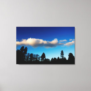Lienzo Árboles de silueta al atardecer