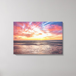 Lienzo Atardecer sobre la playa y el mar