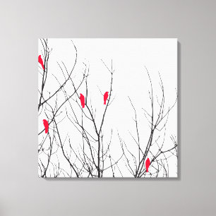 Lienzo Aves rojas brillantes artísticas en ramas de árbol