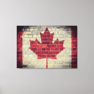 Lienzo Bandera de Canadá vieja en una pared de ladrillo