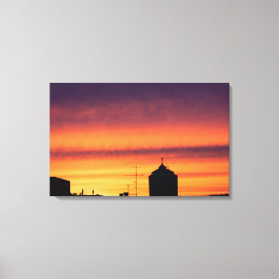 Lienzo Bauarbeiter im Sonnenaufgang über der Stadt