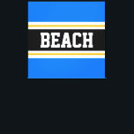 Lienzo BEACH Fun Bright Blue Black Yellow Stripes<br><div class="desc">Este colorido diseño deportivo presenta texto BEACH en negrita dentro de una amplia franja central horizontal negra con rayas de carreras blancas y amarillas doradas contra rayas externas de color azul brillante. El texto se puede personalizar.</div>