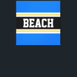 Lienzo BEACH Fun Bright Blue Black Yellow Stripes<br><div class="desc">Este colorido diseño deportivo presenta texto BEACH en negrita dentro de una amplia franja central horizontal negra con rayas de carreras blancas y amarillas doradas contra rayas externas de color azul brillante. El texto se puede personalizar.</div>