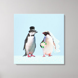 Lienzo Bella pareja de pingüinos en boda sobre azul claro