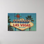 Lienzo Bienvenidos A Las Vegas Wall Art<br><div class="desc">Esta impresión de lienzo muestra un cartel vintage con las palabras "Bienvenidos a las fabulosas Vegas Nevada" con palmeras en el fondo bajo un cielo azul claro en este estilo y tema vintage y clásico del arte. Nuestras impresiones se imprimen con la máxima resolución en papel de archivo de algodón-poli,...</div>