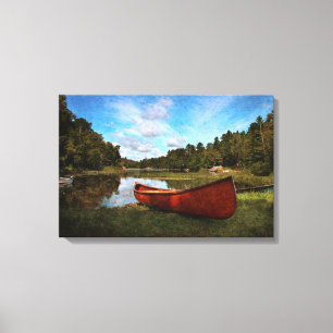 Lienzo Canoa roja en la orilla del lago