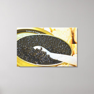 Lienzo Caviar negro y una cuchara de nácar para
