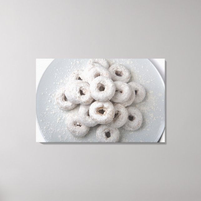 Lienzo Cierre de los donuts en polvo en una placa (Anverso)