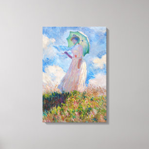 Lienzo Claude Monet - Mujer con un Parasol mirando a la i